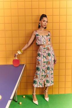 Boxy crop with bold statement buttons with midi skirt