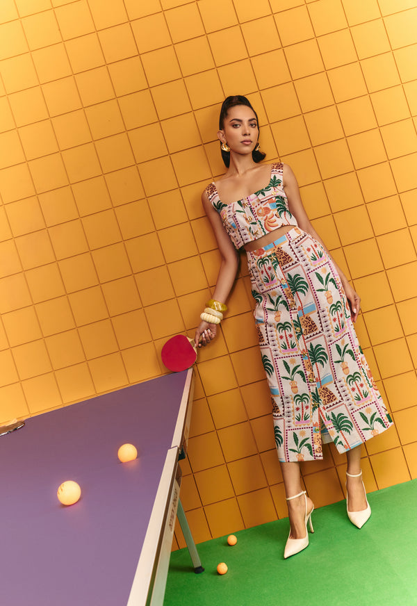 Boxy crop with bold statement buttons with midi skirt