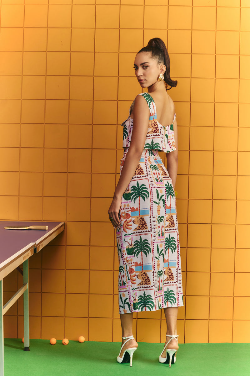 Boxy crop with bold statement buttons with midi skirt