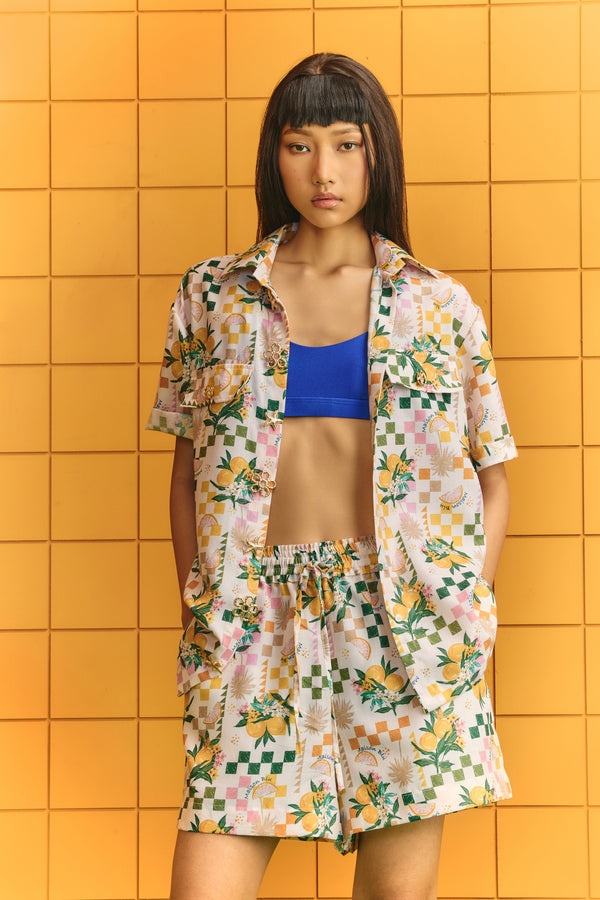 Shirt with bold statement buttons with drawstring shorts