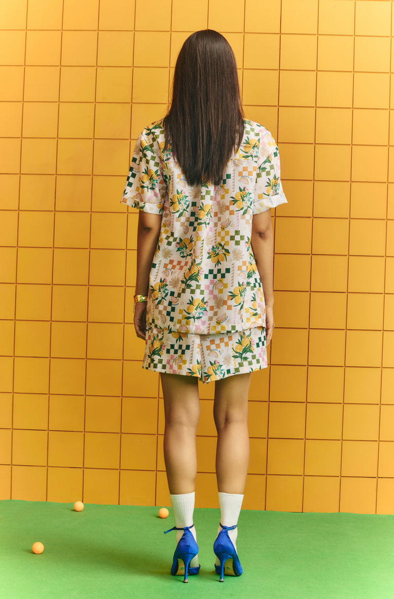 Shirt with bold statement buttons with drawstring shorts