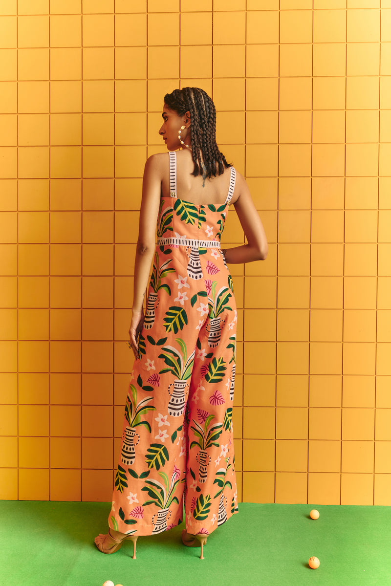 Long strappy jumpsuit with bold statement buttons