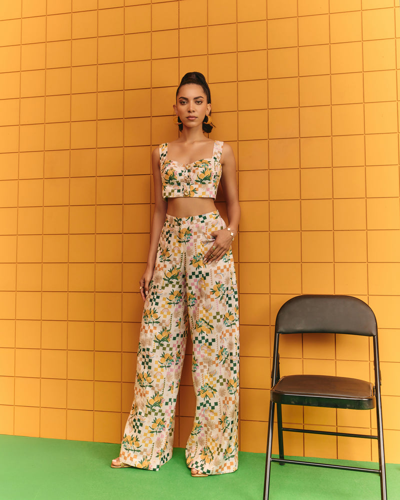 Corset bustier with flare pants with statement buttons