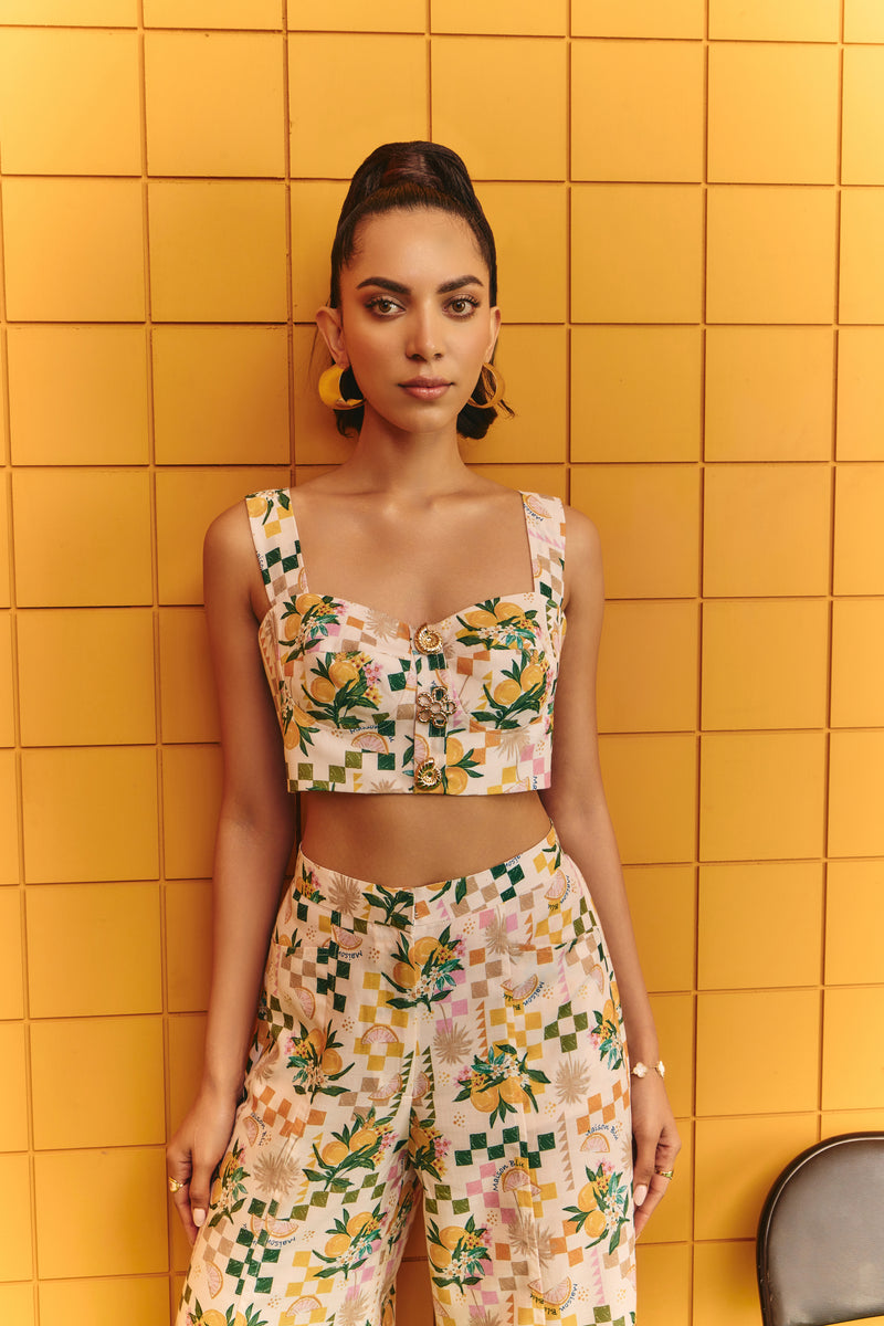 Corset bustier with flare pants with statement buttons