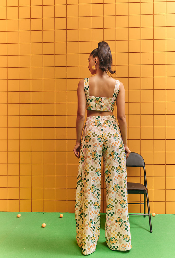CORSET BUSTIER WITH FLARE PANTS WITH STATEMENT BUTTONS