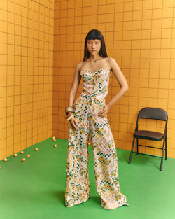 Corset with bold statement buttons with flare pants