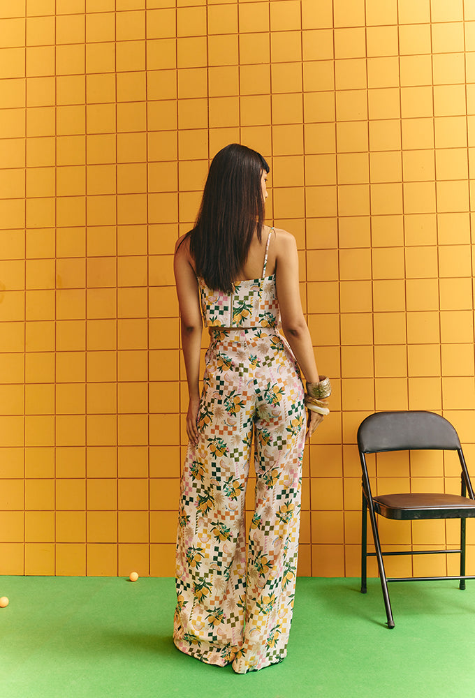 CORSET WITH BOLD STATEMENT BUTTONS WITH FLARE PANTS