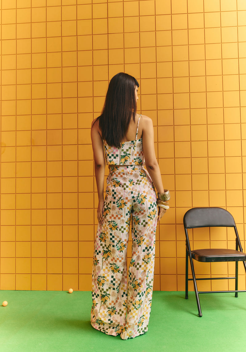 Corset with bold statement buttons with flare pants