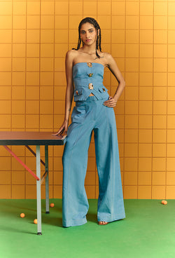 Light blue tube denim with bold buttons with flare pants
